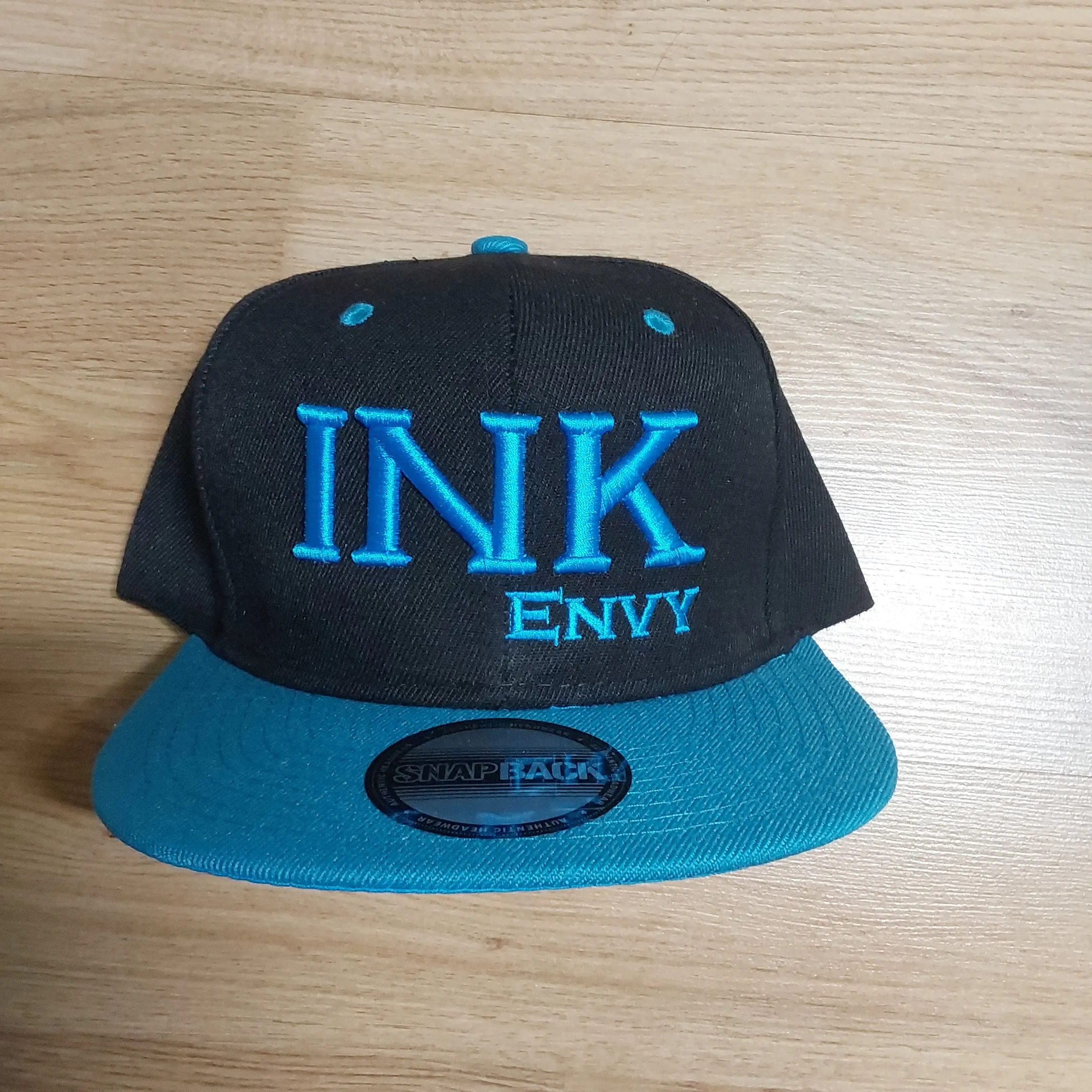 Snapback Bold INK Turquoise on Black With Puff Lettering